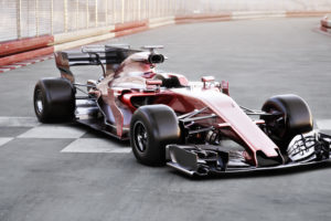 Motor sports competitive team racing. Generic red race car parked at the finish line of a race track