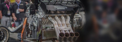 Motorsport engine emphasizing metal pipes