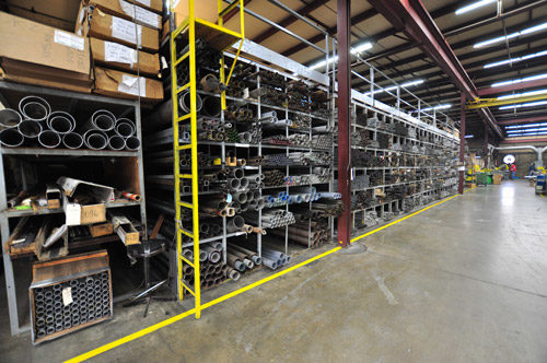 Tube rack displaying a variety of tubing at warehouse