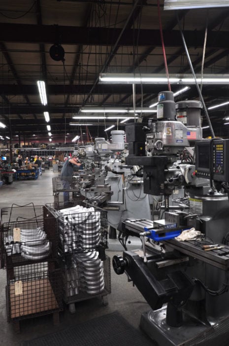 Fitting department machinery at Woolf Aircraft Products facility