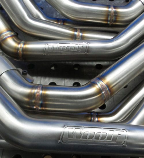 close up of metal tubes used in an engine