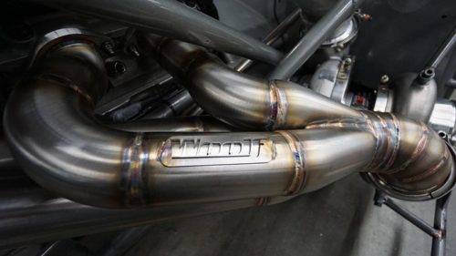 Fabricated metal pipe as part of an engine